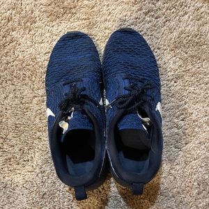 Navy blue Nike athletic shoe. Size 11